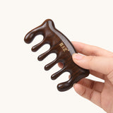 Massageur à racloir en forme d'ours