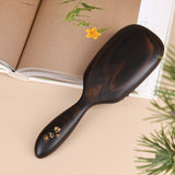 brosse à cheveux en bois noir avec dents 2