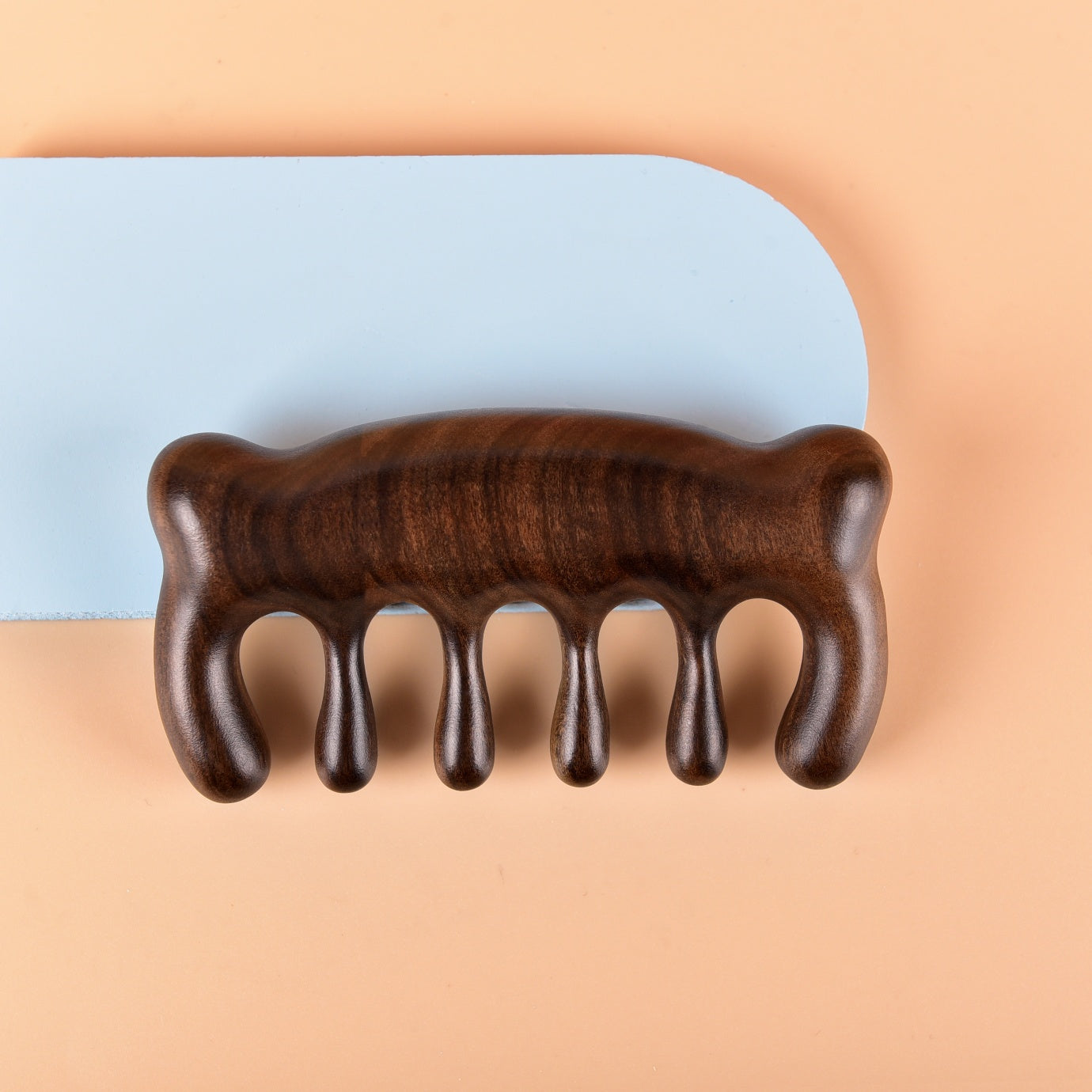 Massageur à racloir en forme d'ours