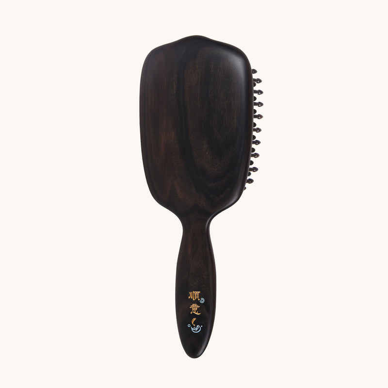 Tooth inserted blackwood hair brush