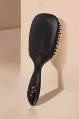 brosse à cheveux en bois noir avec dents 2